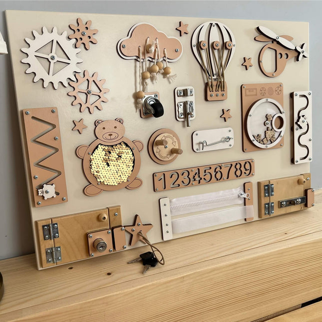 Montessori busy board with doors and locks (40×60 cm)